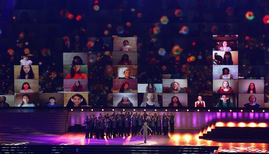 Eric Whitacre conducts the National Youth Choir during the Opening Ceremony for the Glasgow 2014 Commonwealth Games Eric Whitacre conducts the National Youth Choir during the Opening Ceremony for the Glasgow 2014 Commonwealth Games