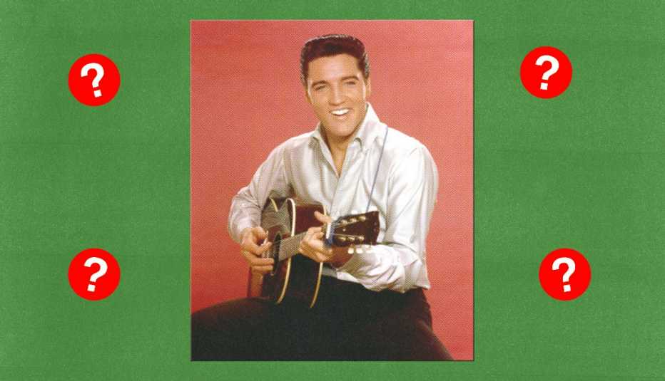 elvis playing a guitar