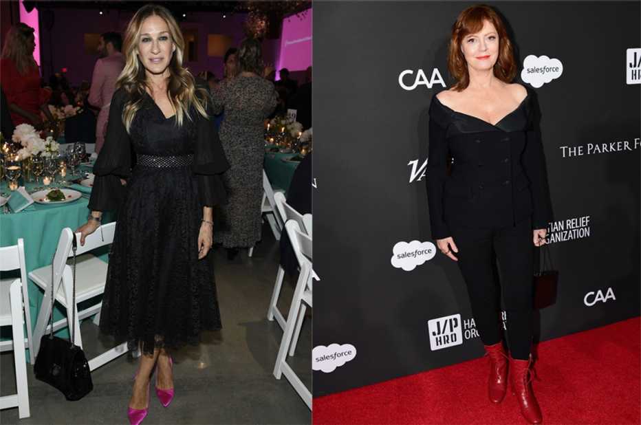 Women dressed in black wearing different color shoes. 