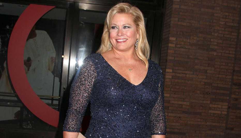 Plus size model Emme in a navy dress