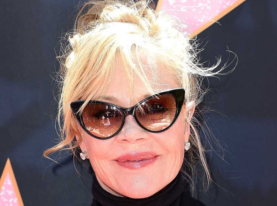 Melanie Griffith with her hair up