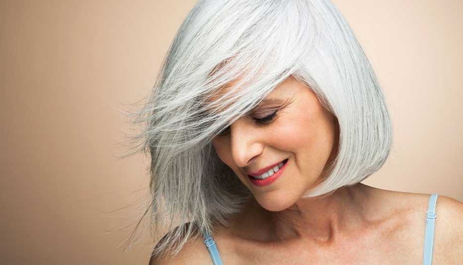 a woman with grey hair in a bob cut a woman with grey hair in a bob cut