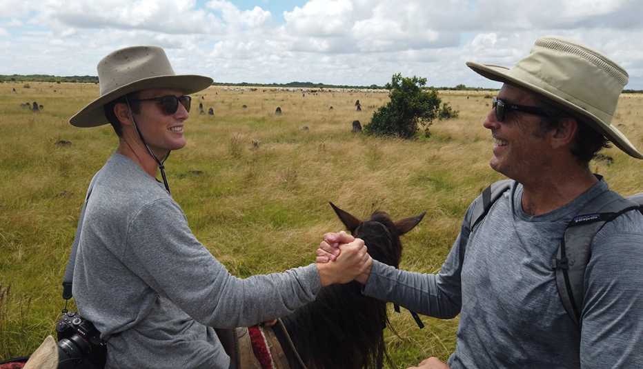 Mack and Bob Woodruff riding horses in Eastern Columbia