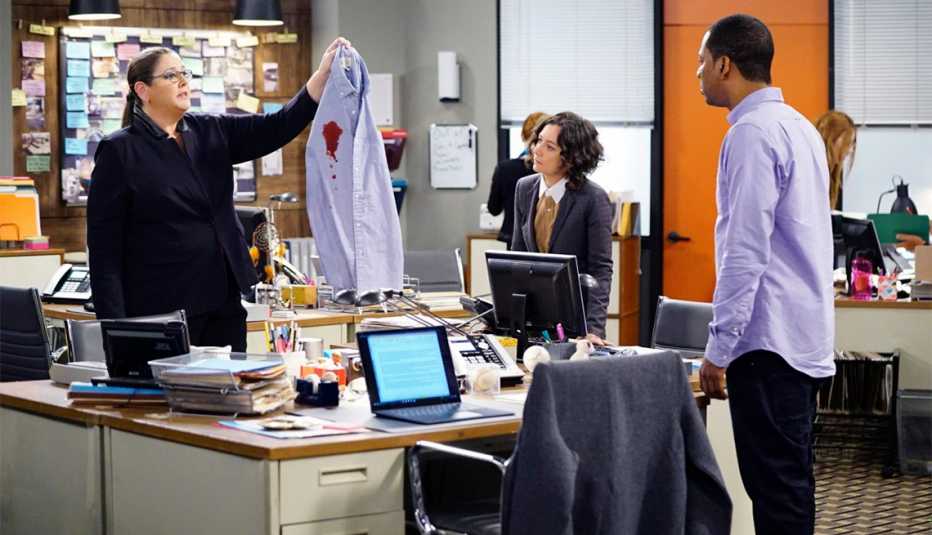 Camryn Manheim as Ms. Meadows, Sara Gilbert as Cheryl, and Tony Rock as Vince in "Living Biblically" Camryn Manheim as Ms. Meadows, Sara Gilbert as Cheryl, and Tony Rock as Vince in "Living Biblically"