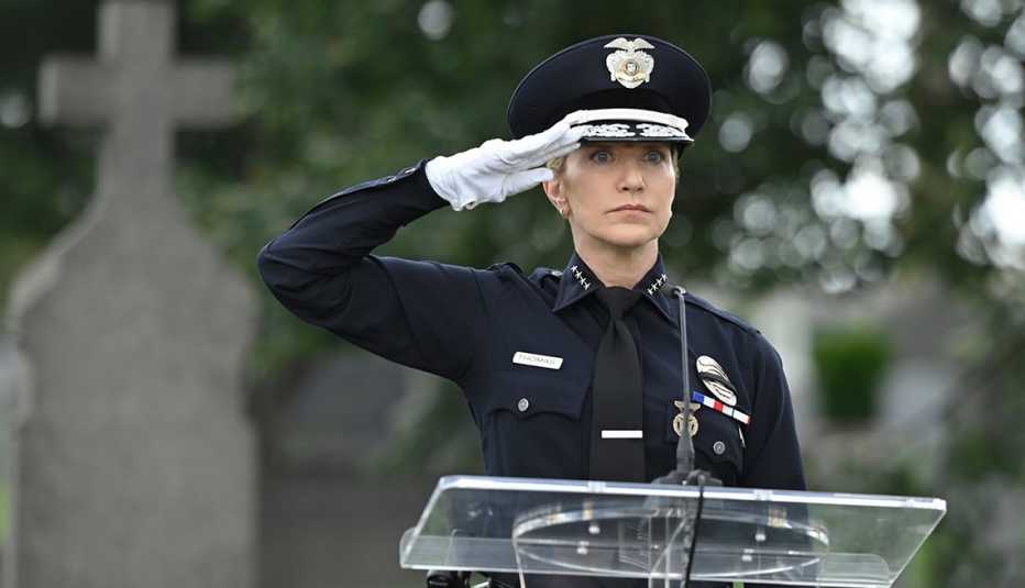 Edie Falco performs a salute as Abigail Tommy Thomas in the C B S police drama Tommy Edie Falco performs a salute as Abigail Tommy Thomas in the C B S police drama Tommy