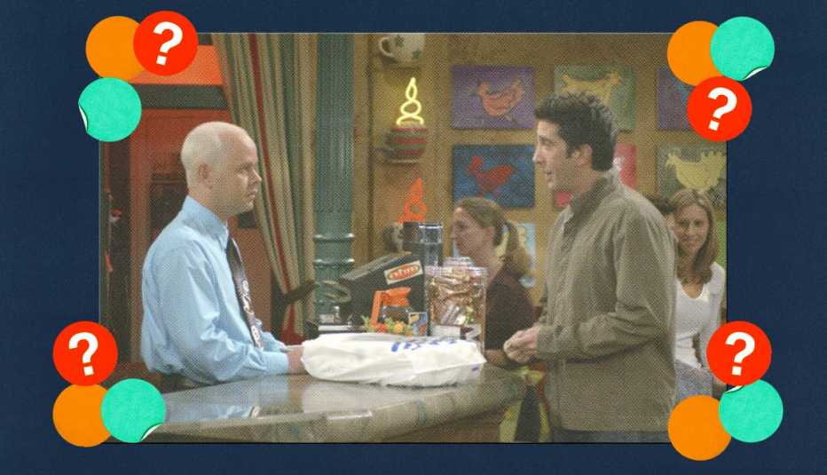 James Michael Tyler behind counter, talking to David Schwimmer as Ross in a still from Friends; surrounded by orange, teal and red circles with question marks in them
