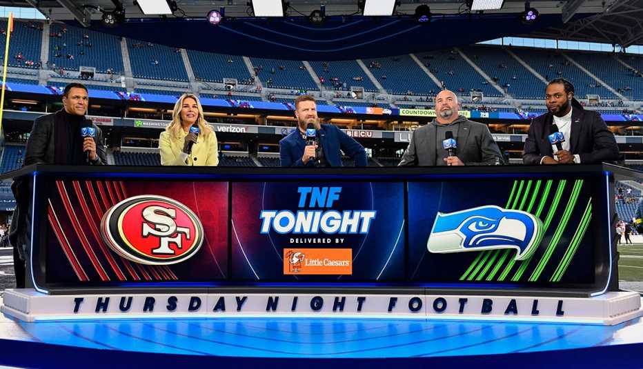 tony gonzalez charissa thompson ryan fitzpatrick andrew whitworth and richard sherman sitting on the set of prime video's thursday night football