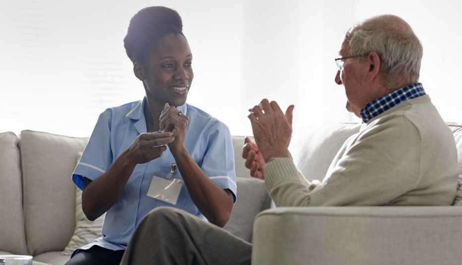 a therapist doing a tapping session with a man
