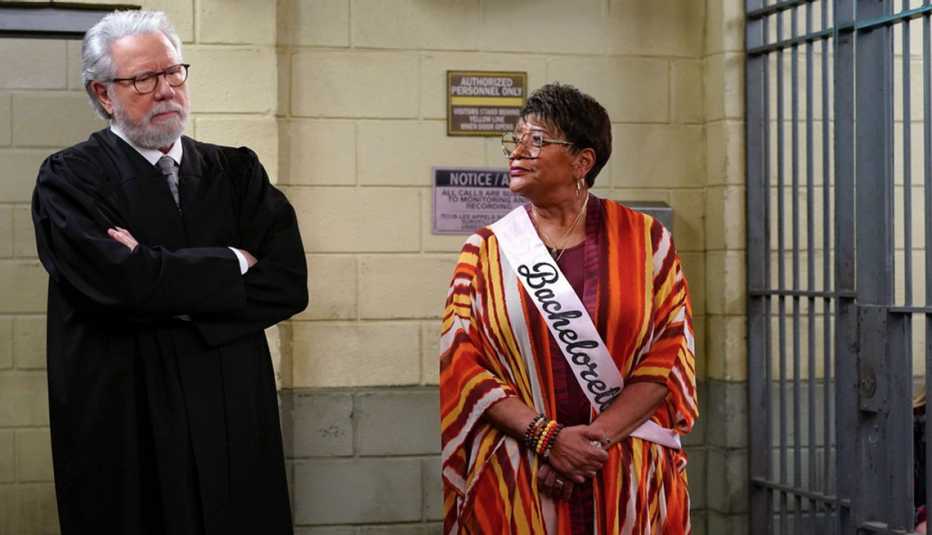 John Larroquette and Marsha Warfield standing inside a jail cell in "Night Court." John Larroquette and Marsha Warfield standing inside a jail cell in "Night Court."