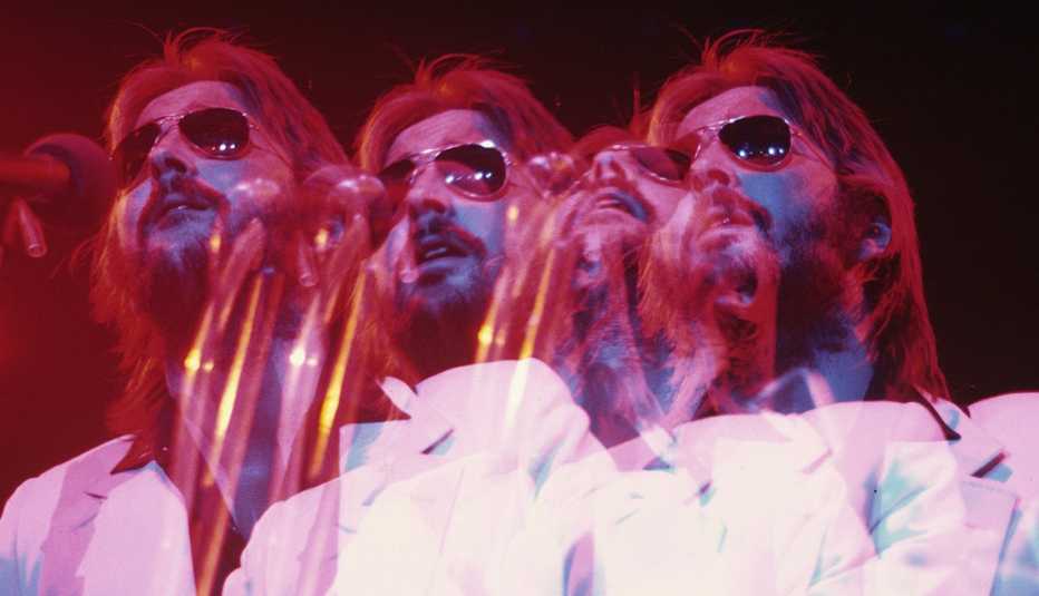 Eric Clapton in 1974, multiple exposure of him singing