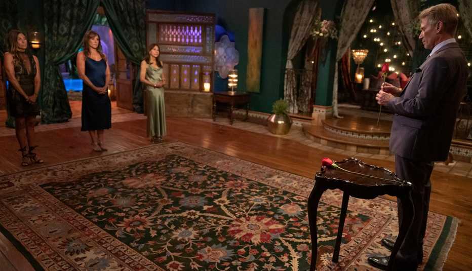Leslie, Faith and Theresa stand across from Gerry Turner during the rose ceremony on "The Golden Bachelor." Leslie, Faith and Theresa stand across from Gerry Turner during the rose ceremony on "The Golden Bachelor."