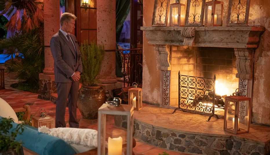 "The Golden Bachelor" Gerry Turner stands in front of a fireplace.