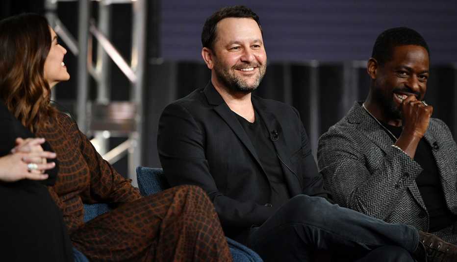 Dan Fogelman sitting in between Mandy Moore and Sterling K Brown