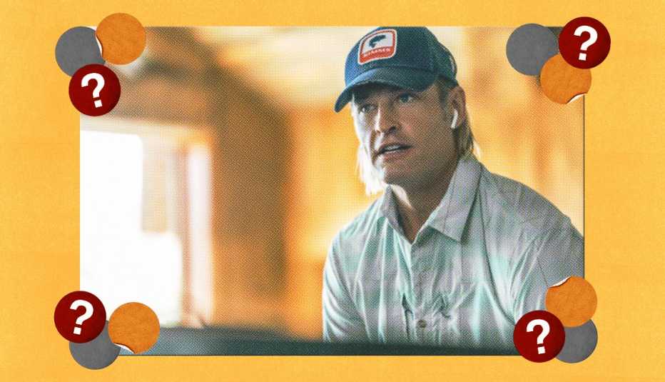 a man with a hat on in a scene from Yellowstone