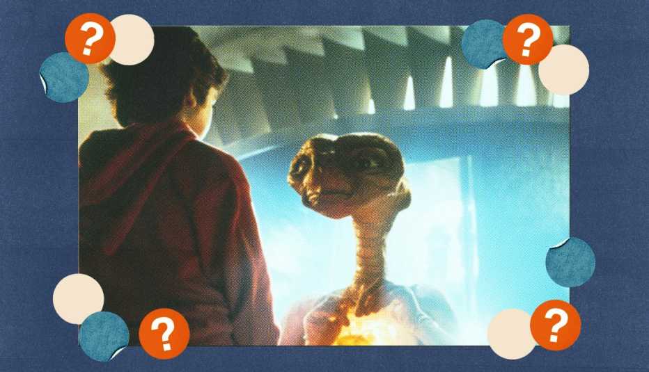 Henry Thomas talking with E T in a scene from the film E T The Extra-Terrestrial; surrounded by off-white, blue and red circles with question marks in them