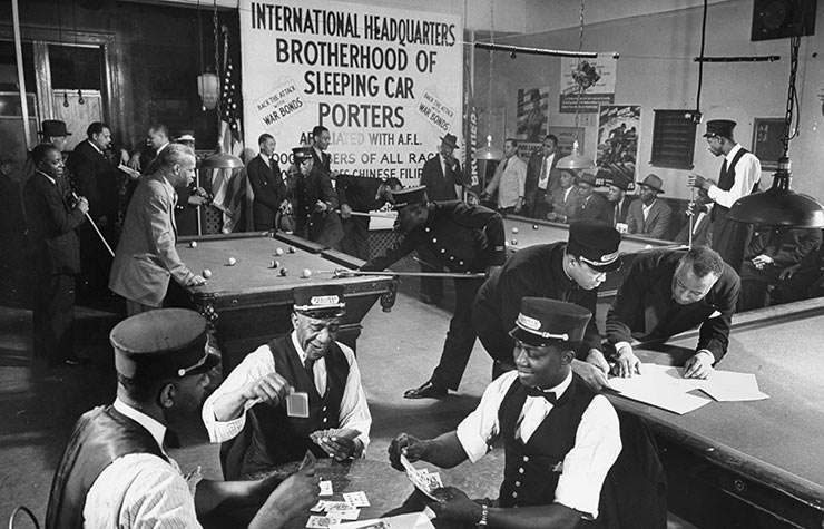 Uniformed African-American railroad porters playing pool & cards while relaxing at Brotherhood of Sleeping Car Porters HQ in Harlem, Historical Review of Leading Black Civil Rights Organizations Uniformed African-American railroad porters playing pool & cards while relaxing at Brotherhood of Sleeping Car Porters HQ in Harlem, Historical Review of Leading Black Civil Rights Organizations