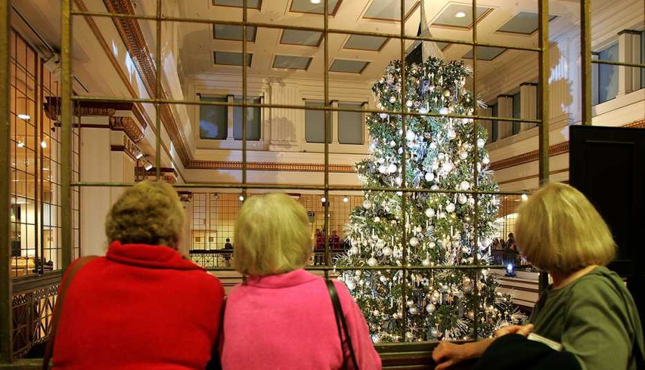 Shoppers look at the Christmas tree in Marshall Field's