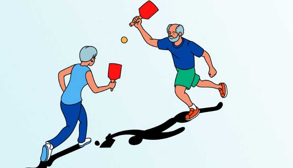 two people playing pickleball