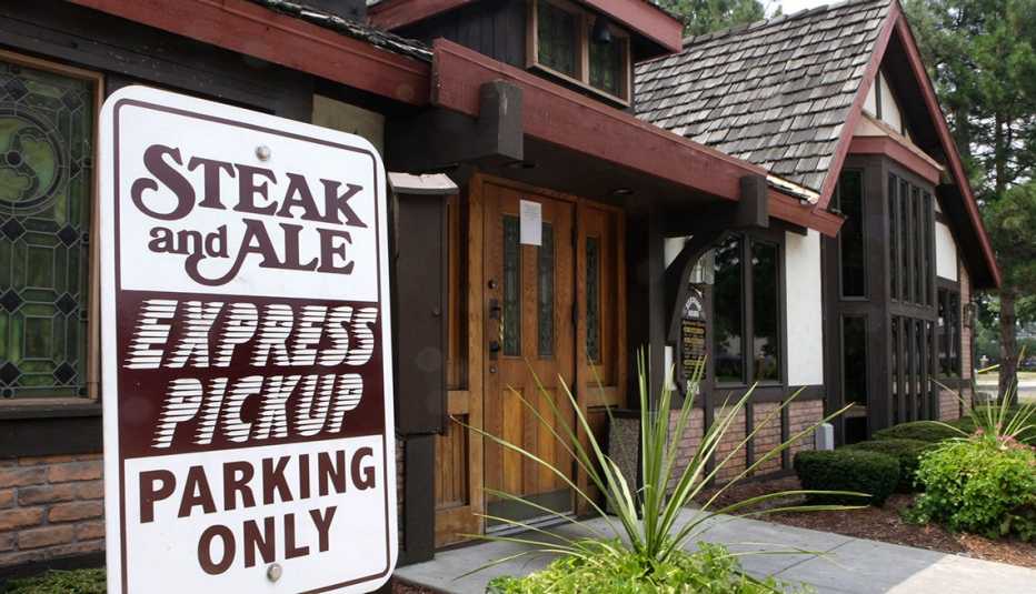 restaurant with sign in front identifying it as a steak and ale restaurant steak and ale restaurant