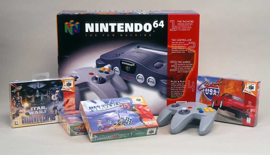 Brand new boxes on display of a Nintendo 64 game system with games and controller in 1996 Brand new boxes on display of a Nintendo 64 game system with games and controller in 1996