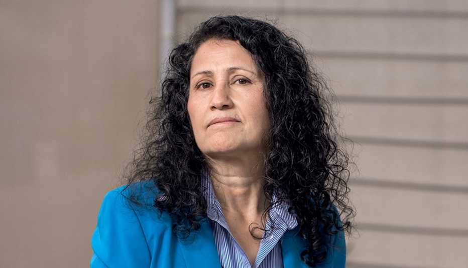 portrait of Maria Garcia in the kitchen of her restaurant
