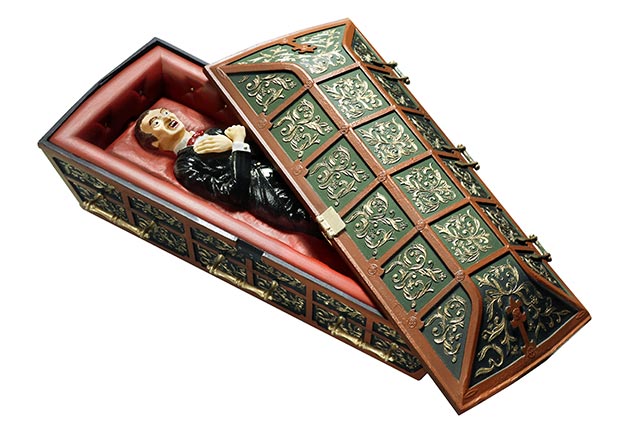 what we believe skeptical aliens ufo heaven hell zombies angels reincarnation ghosts astrology bigfoot apocalypse vampires poll stats belief vampire coffin toy (Getty Images)