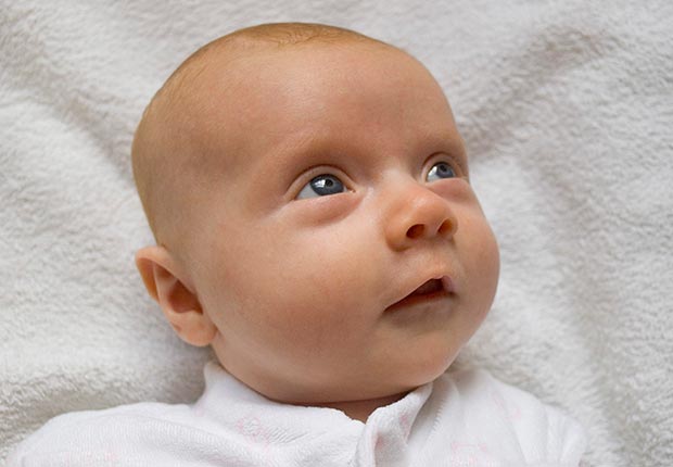 what we believe skeptical aliens ufo heaven hell zombies angels reincarnation ghosts astrology bigfoot apocalypse vampires poll stats belief baby infant (iStockphoto)