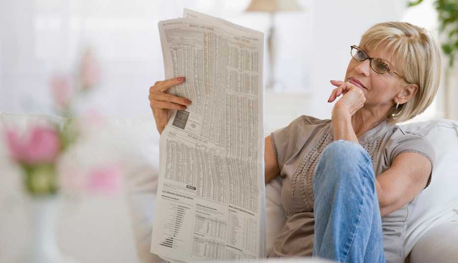 Woman reading a newspaper