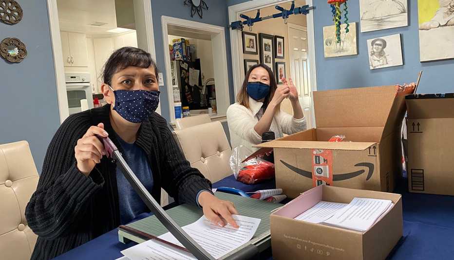 Volunteers are distributing whistles to Asian elders in case they need to call for help. 