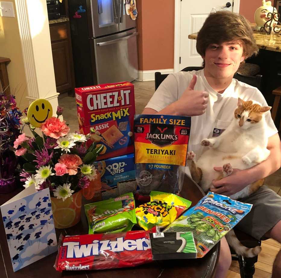 Jonathan Jordan receives his care package of goodies