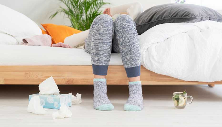 Woman sick in bed concept