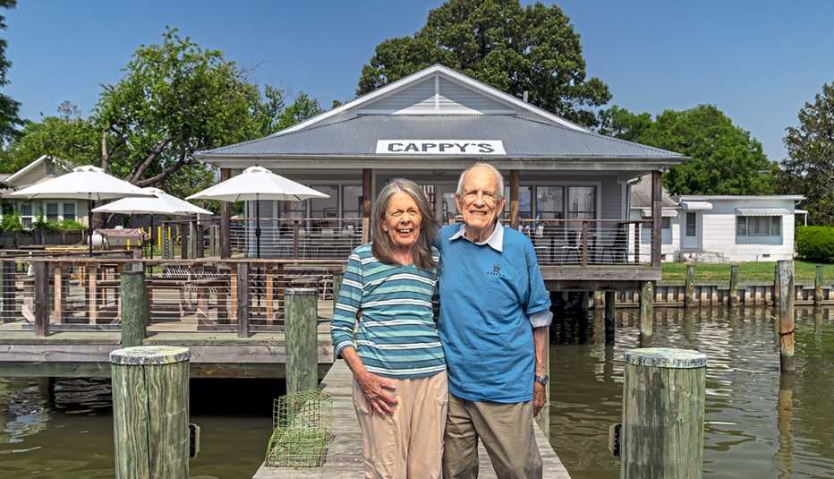 molly and cappy ruppert stand in front of their restaurant