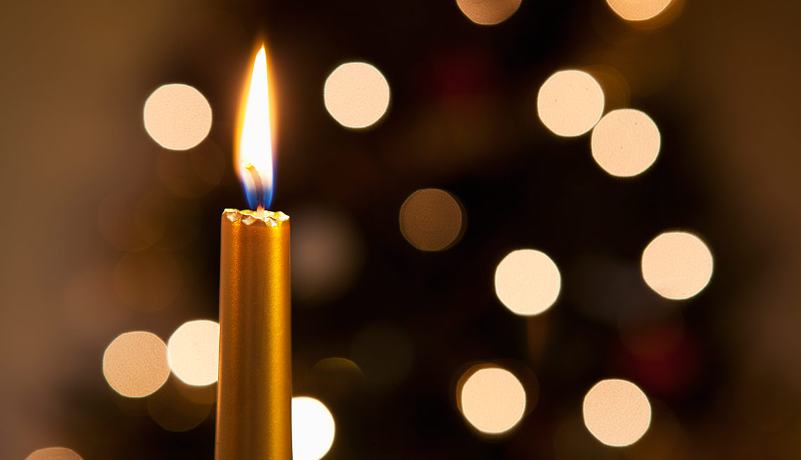 Candle with holiday lights