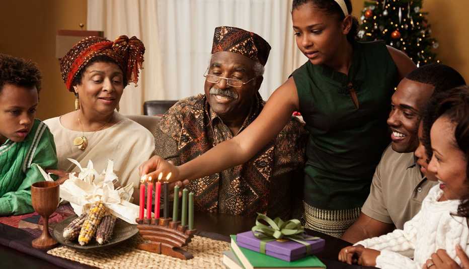a multi generational family celebrating kwanzaa a multi generational family celebrating kwanzaa