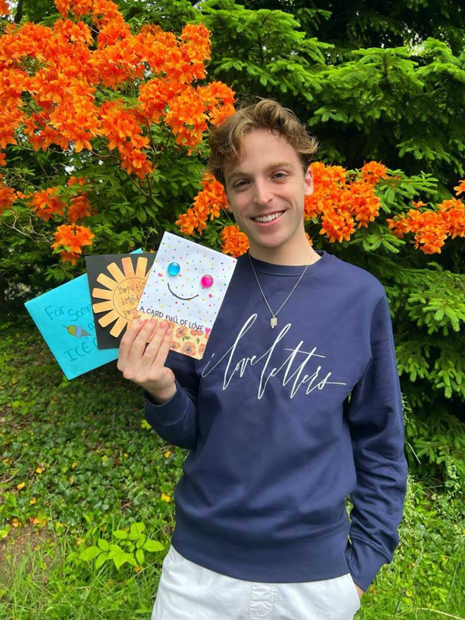 letters for our elders founder jacob cramer posing with letters