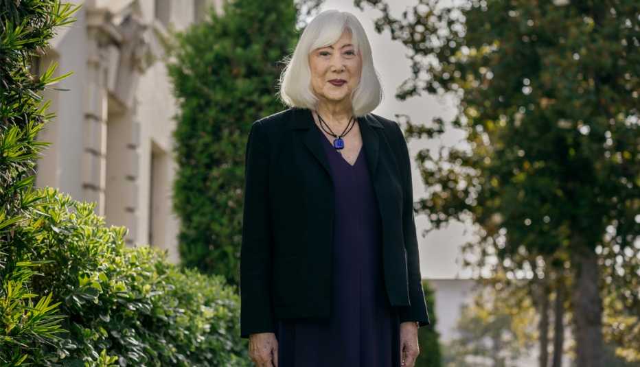 mia yamamoto standing in a garden