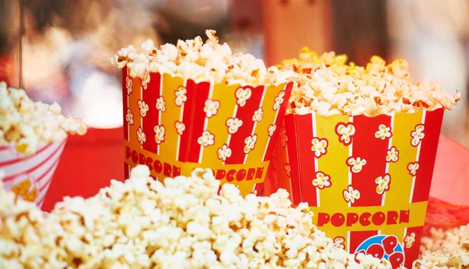 three bags of freshly popped movie-theater popcorn three bags of freshly popped movie-theater popcorn