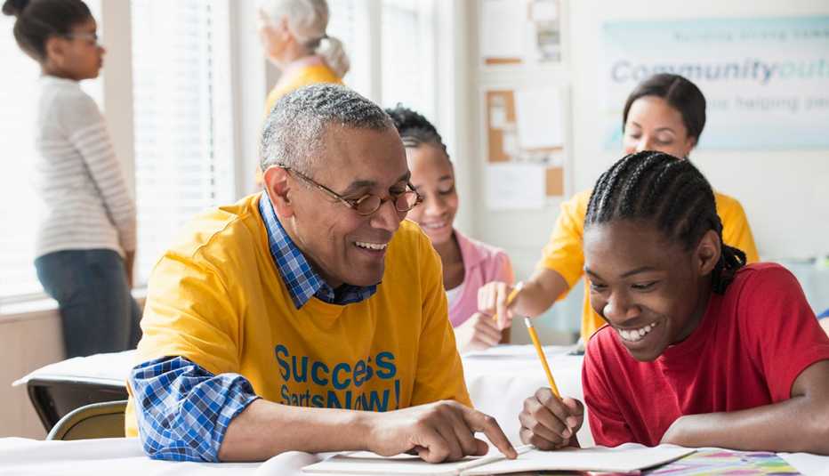 volunteers tutoring students in classroom