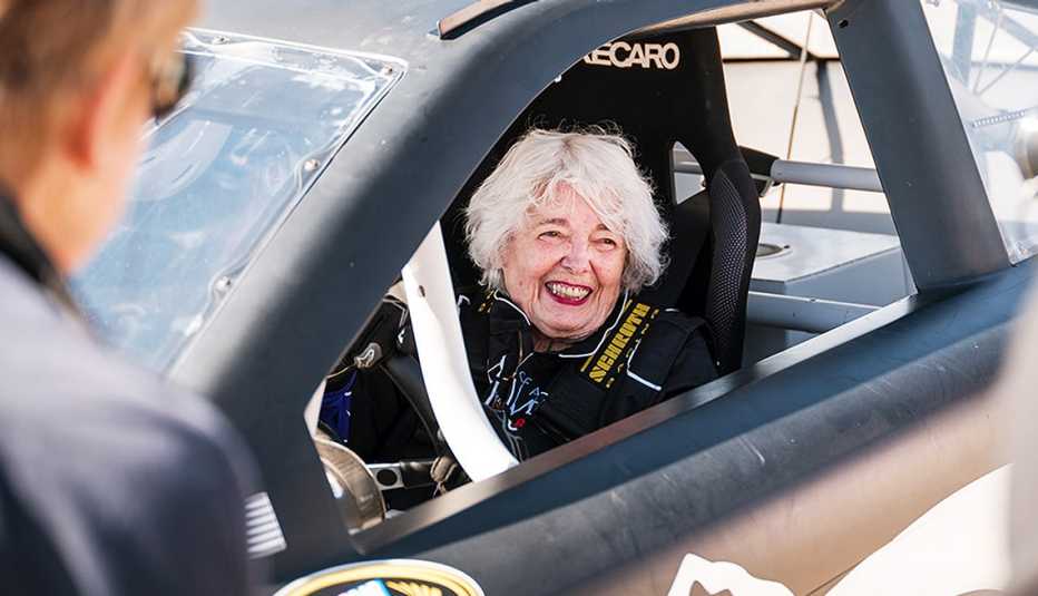 a woman in a race car
