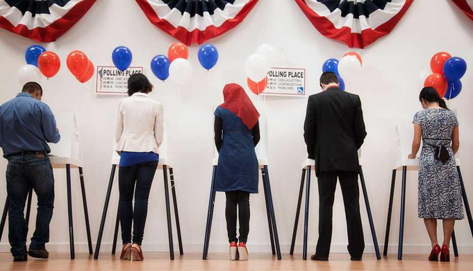 Voters voting in polling place