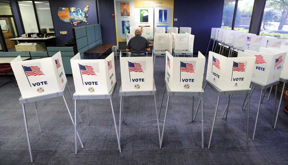 A voter casts his ballot during an election