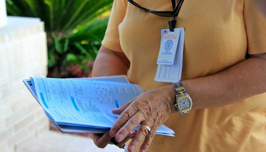 A Census worker with forms