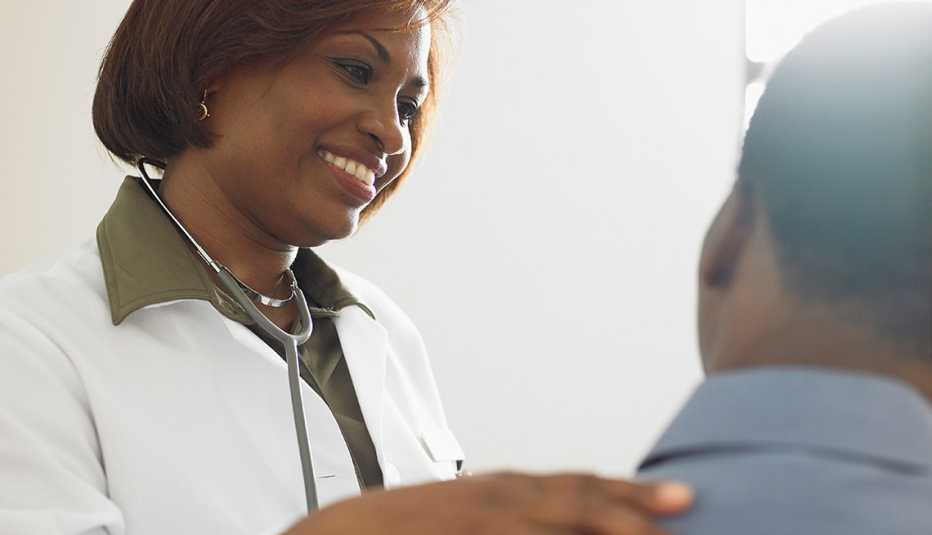 A female doctor talking to a patient