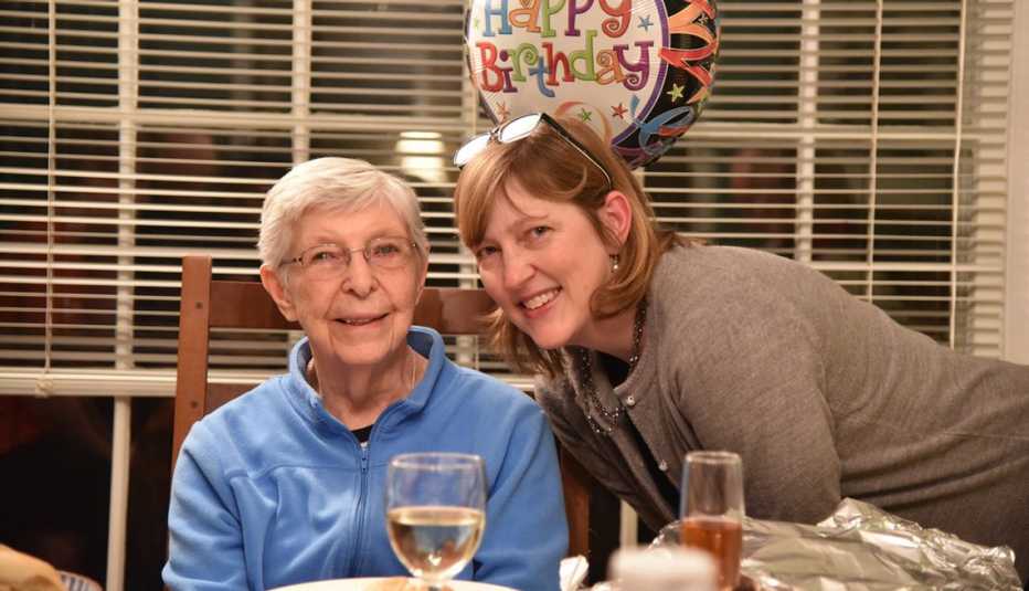 Mildred Hoxie with her daughter Margaret Kaplan. A birthday balloon is behind them