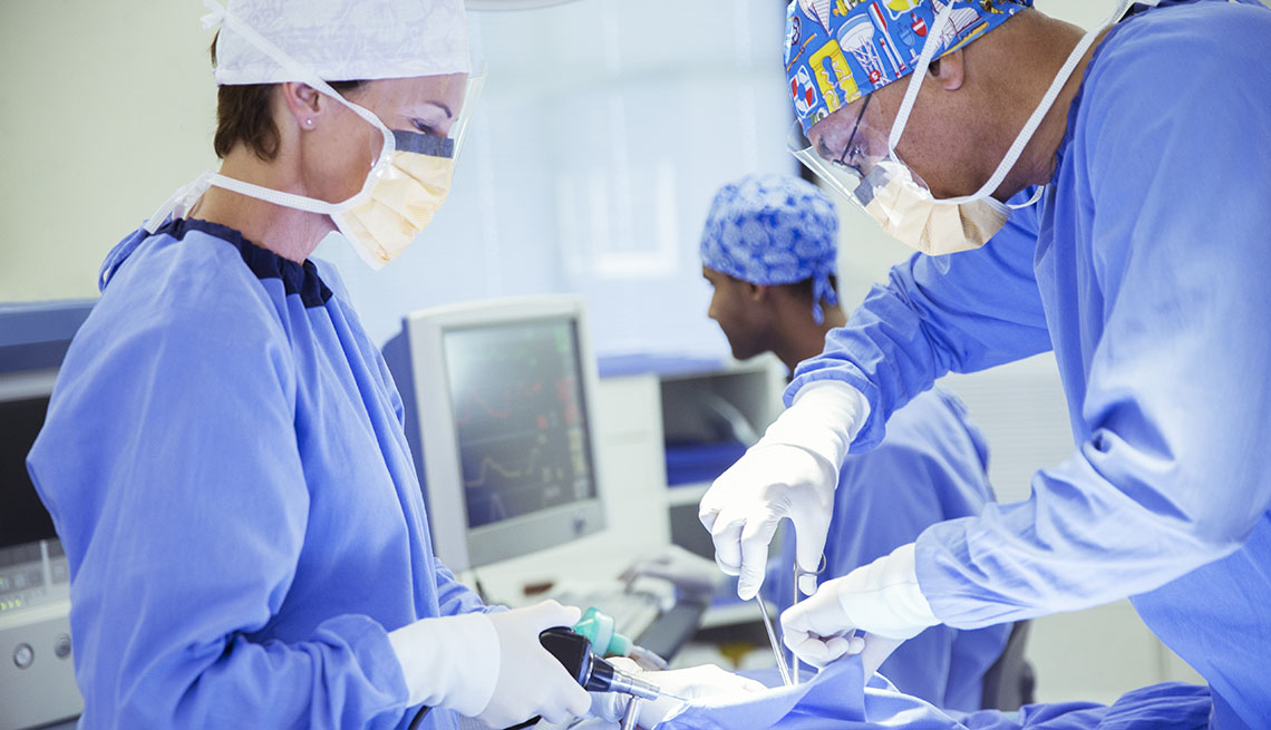 Surgeons performing surgery
