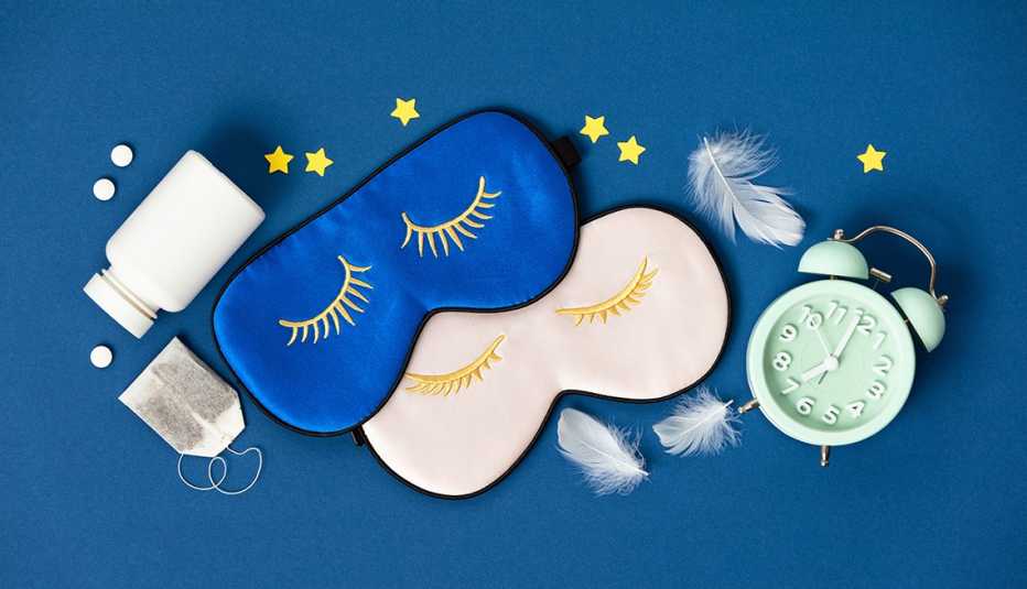 Illustration with a pill bottle, two sleep masks, a clock, stars, a tea bag and feathers