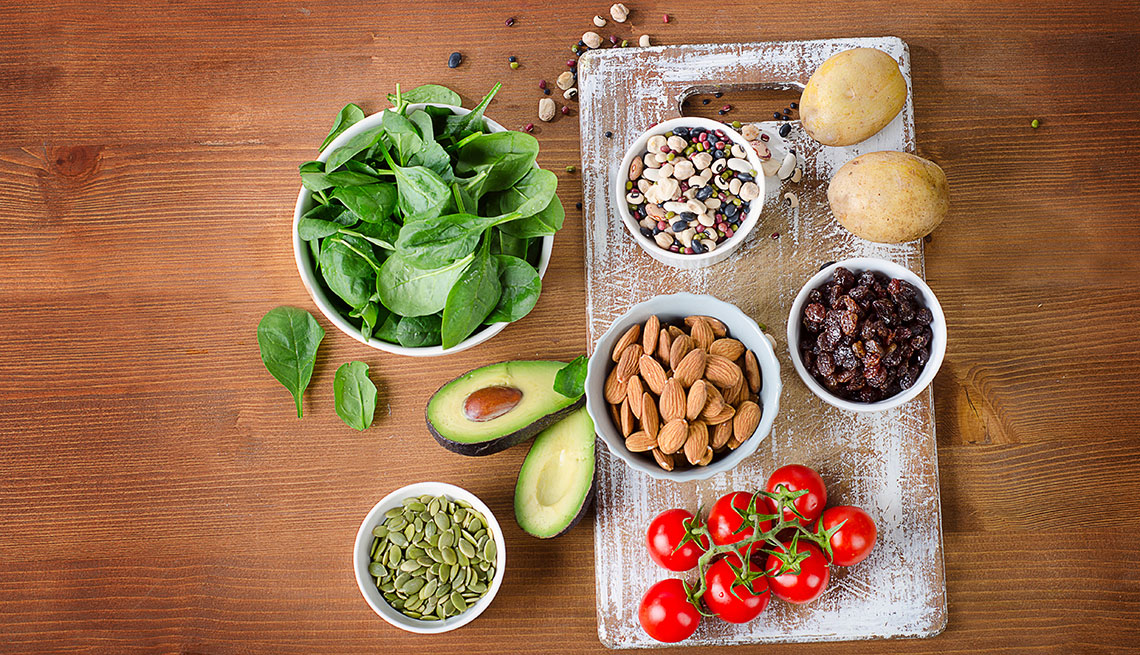 Foods containing potassium on wooden table