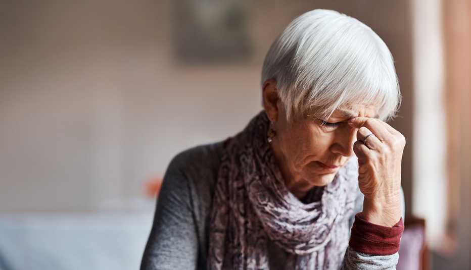 woman experiencing a headache
