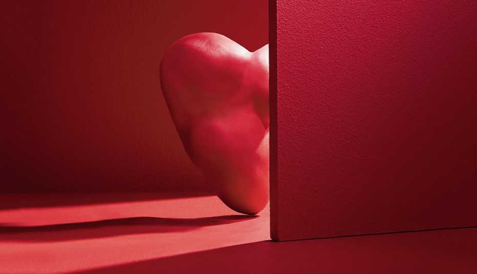 illustration of a heart peeking out from behind a wall