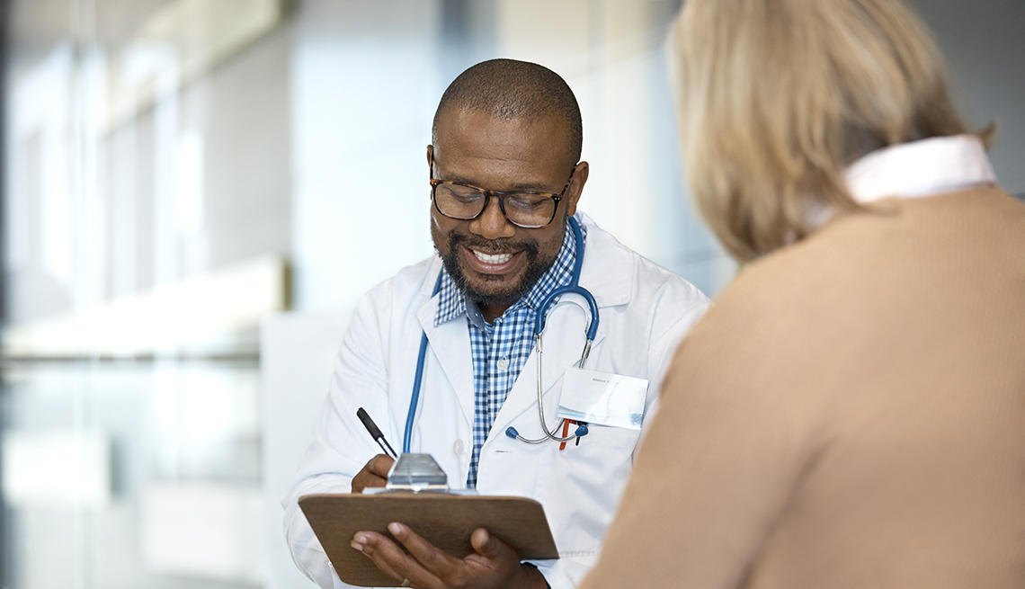 doctor discussing with patient in hospital 